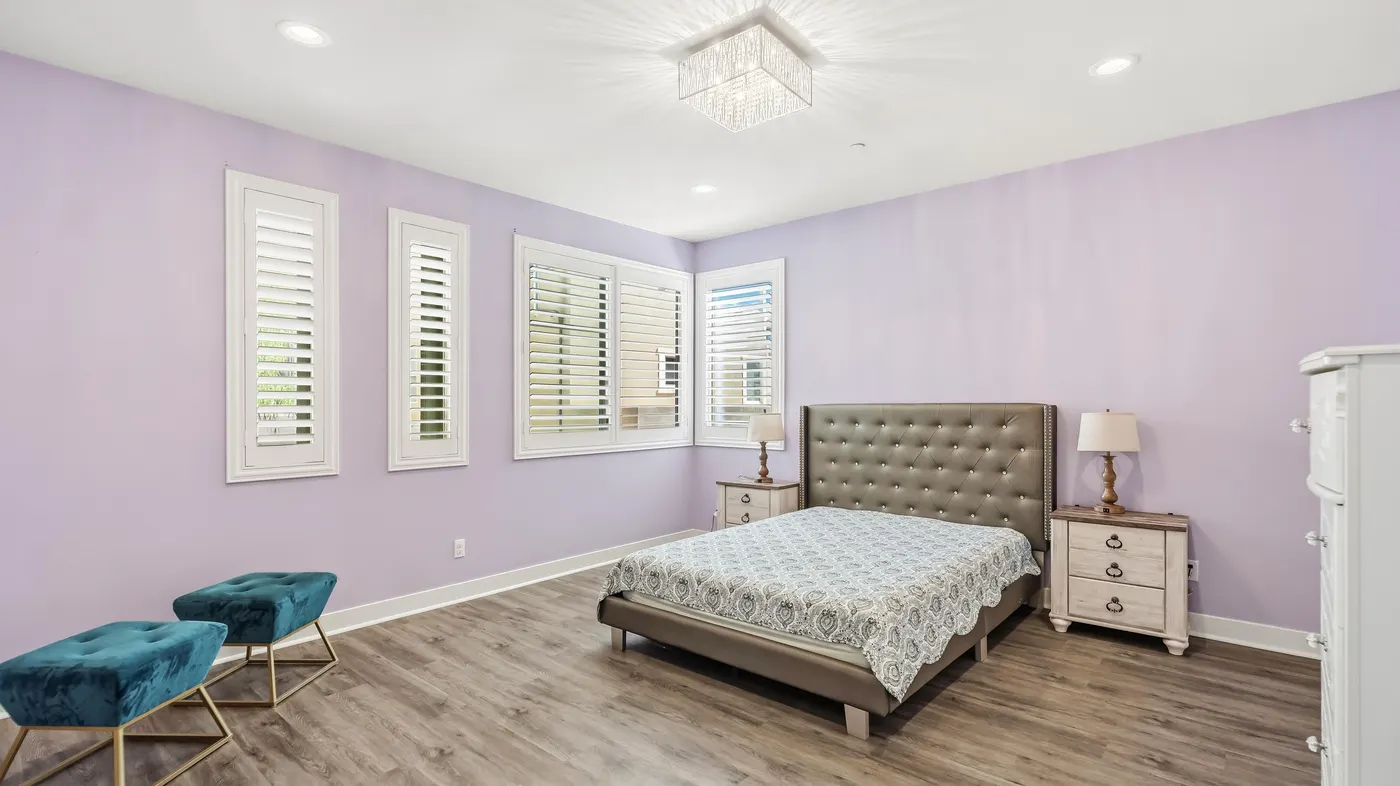 Primary bedroom with plantation shutters